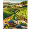 A vibrant jigsaw puzzle framed in a sleek black photo frame, depicting a picturesque vineyard scene with lush green vines, a stone building in the background, and baskets of grapes in the foreground.